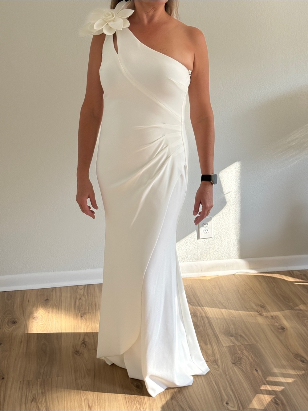 One-Shoulder White Evening Gown with Floral Accent